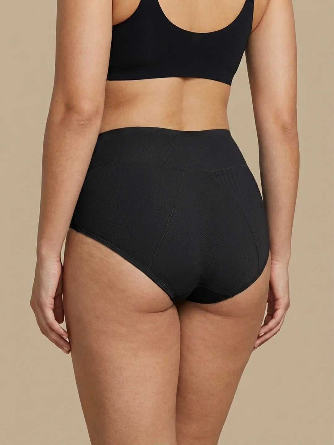 Huggster Brief | Pakke med 10 | Kraftig urinlækage | 100% lækagesikker, dag & nat | Sort